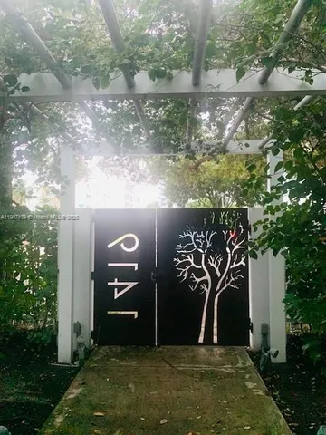 a view of a wooden door of a lake
