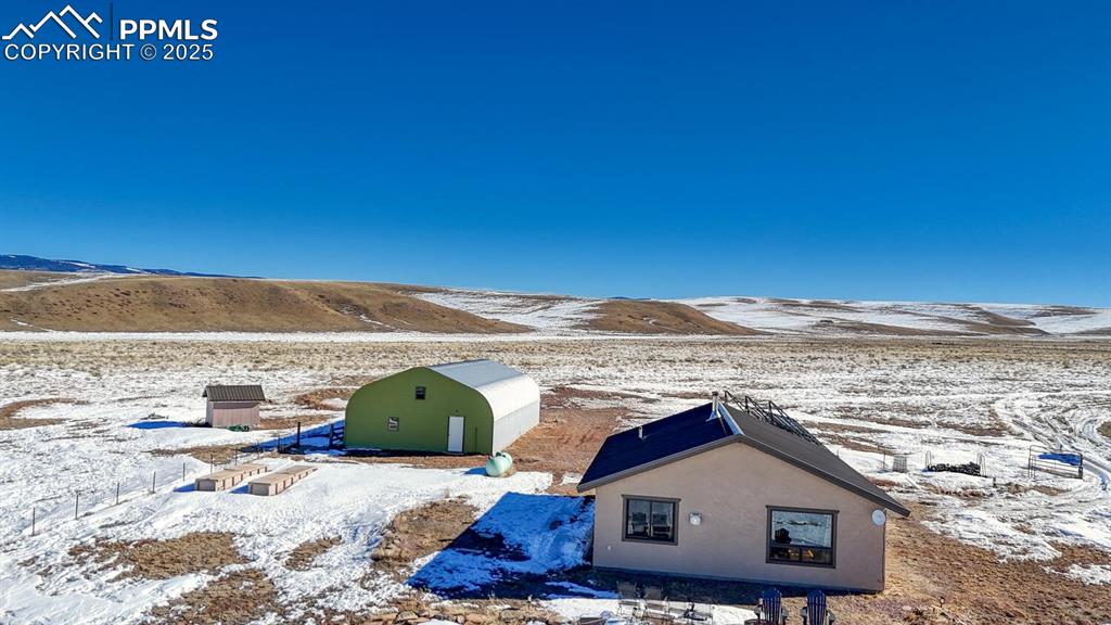 565 Pass Peak Road Westcliffe, CO 81252 - Photo 25 of 50 a front view of a house with a yard