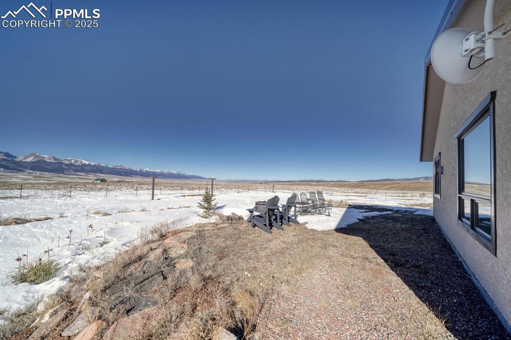 565 Pass Peak Road Westcliffe, CO 81252 - Photo 39 of 50 a view of a room with wooden floor