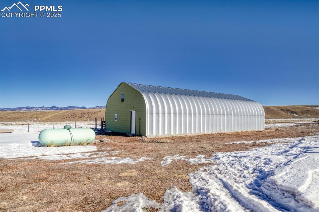 565 Pass Peak Road Westcliffe, CO 81252 - Photo 41 of 50 a view of a back yard of a building