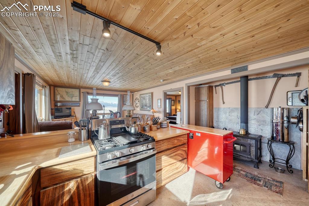 565 Pass Peak Road Westcliffe, CO 81252 - Photo 9 of 50 a very nice looking living room with a large window