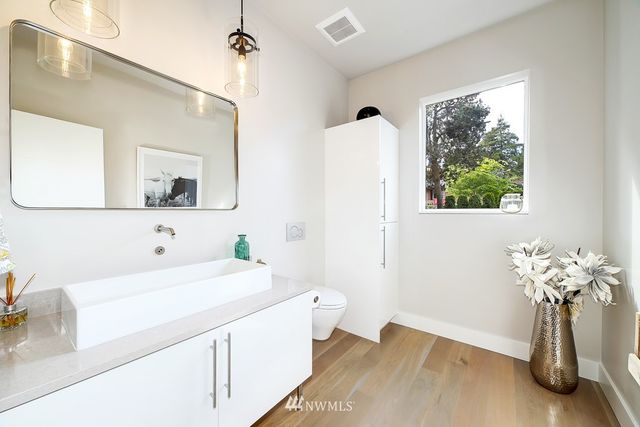 a view of a living room with a refrigerator