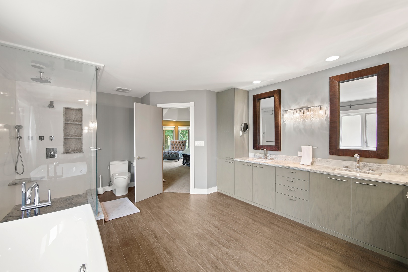 3140 Keystone Road Northbrook, IL 60062 - Photo 14 of 21 a large bathroom with double vanity sinks a large mirror and a shower