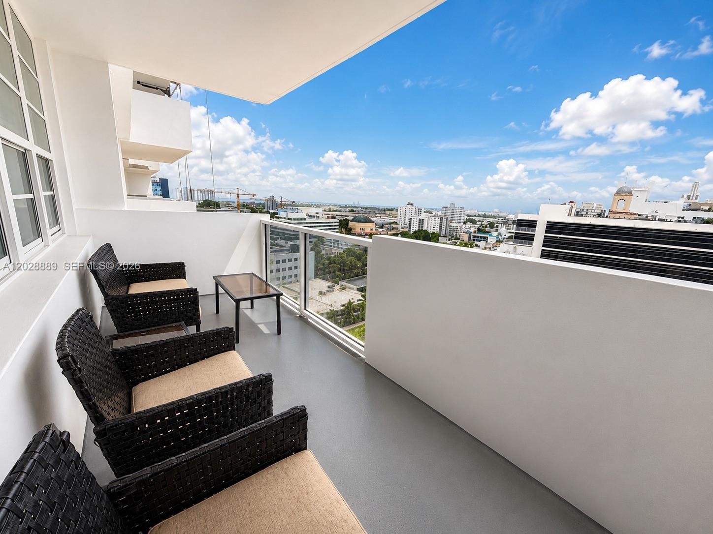 100 Lincoln Road, Unit 1504 Miami Beach, FL 33139 - Photo 17 of 17 a view of roof deck with seating area