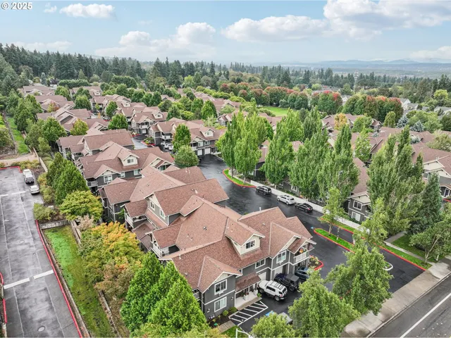 an aerial view of a city with lots of residential buildings