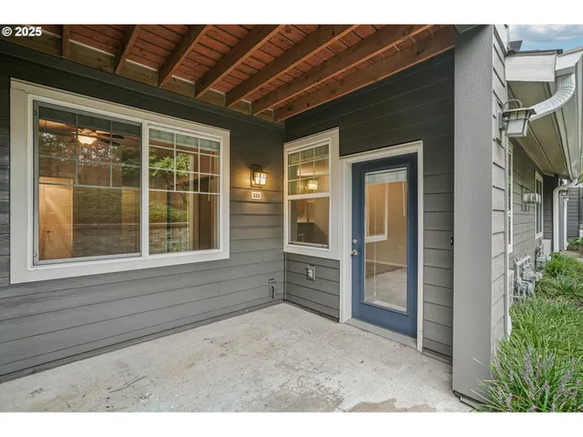a backyard of a house with seating space