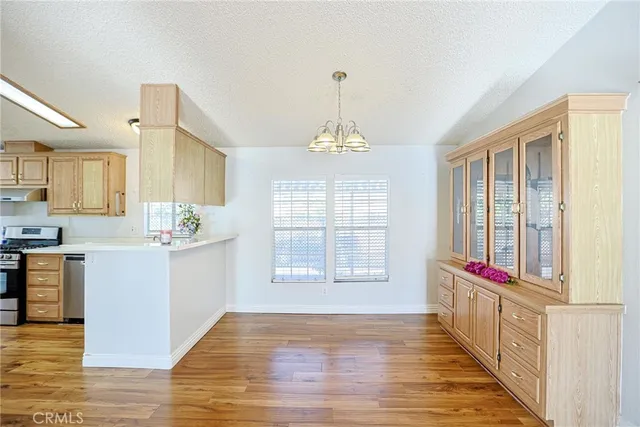 a bathroom with mirror and windows