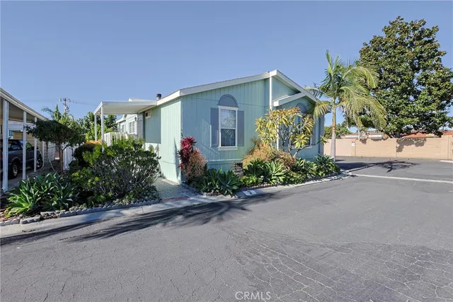 front view of a house with a street