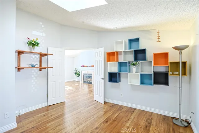 a view of a bathroom with a sink and a mirror