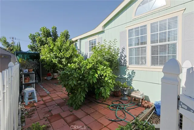 a view of a porch with seating space