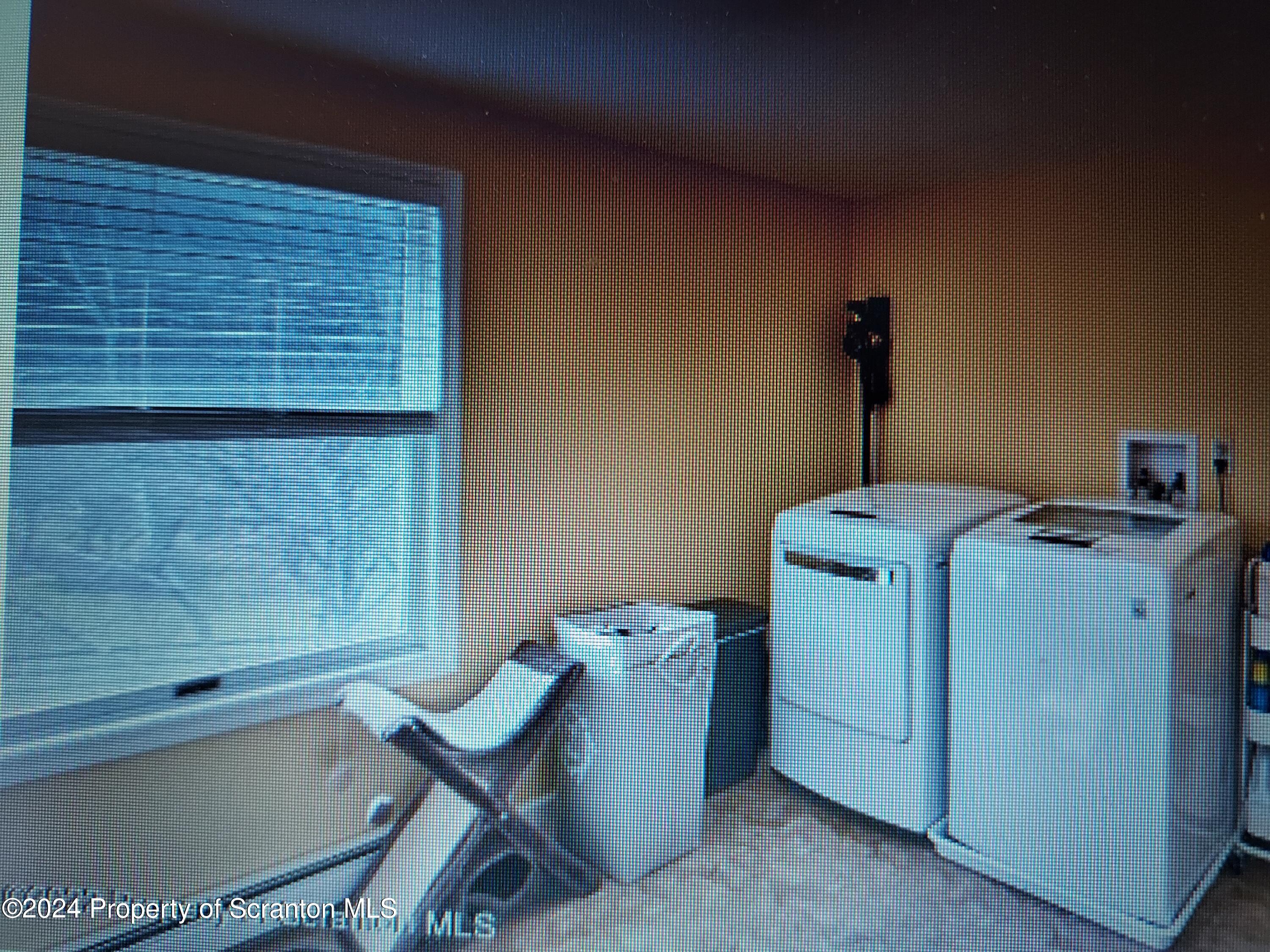 620 Layton Road Clarks Summit, PA 18411 - Photo 7 of 7 a utility room with dryer and washer