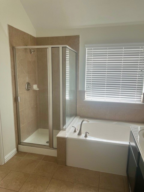3018 Wellington Pass Drive Spring, TX 77373 - Photo 11 of 19 a bathroom with a bathtub and a shower