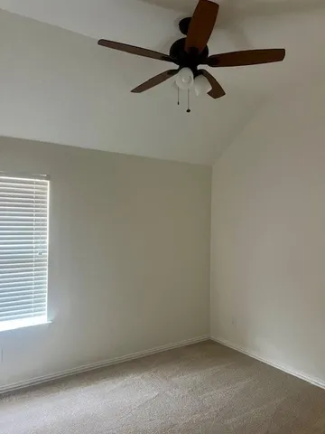 a view of a window in an empty room