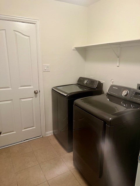 3018 Wellington Pass Drive Spring, TX 77373 - Photo 16 of 19 a utility room with dryer and washer