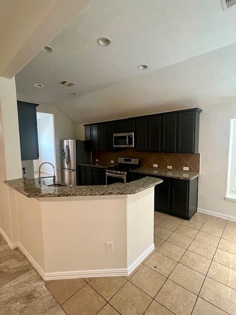 3018 Wellington Pass Drive Spring, TX 77373 - Photo 7 of 19 a kitchen with granite countertop a sink a stove top oven and cabinets