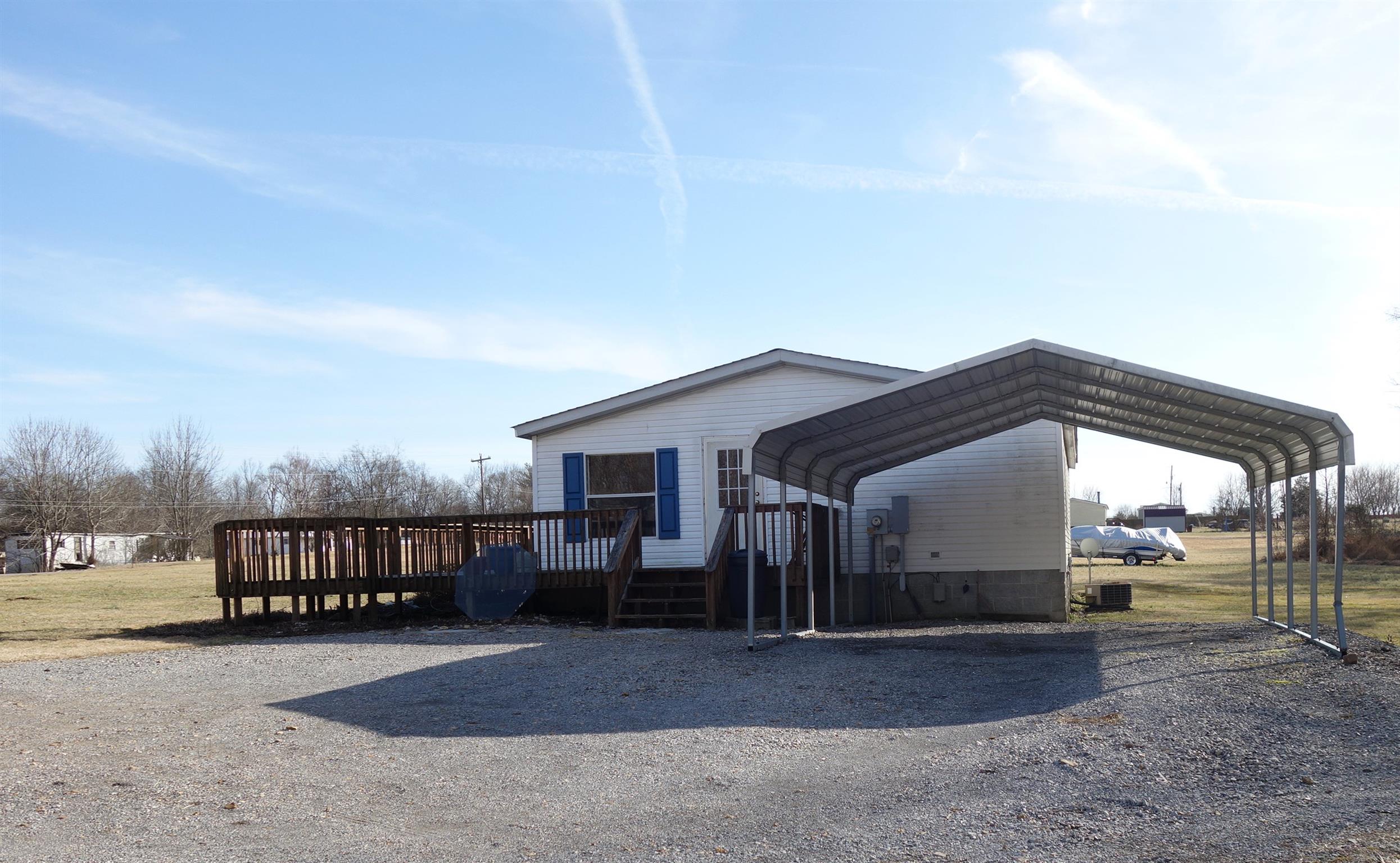 114 East Biggs Road Portland, TN 37148 - Photo 2 of 26 a view of a house with a yard