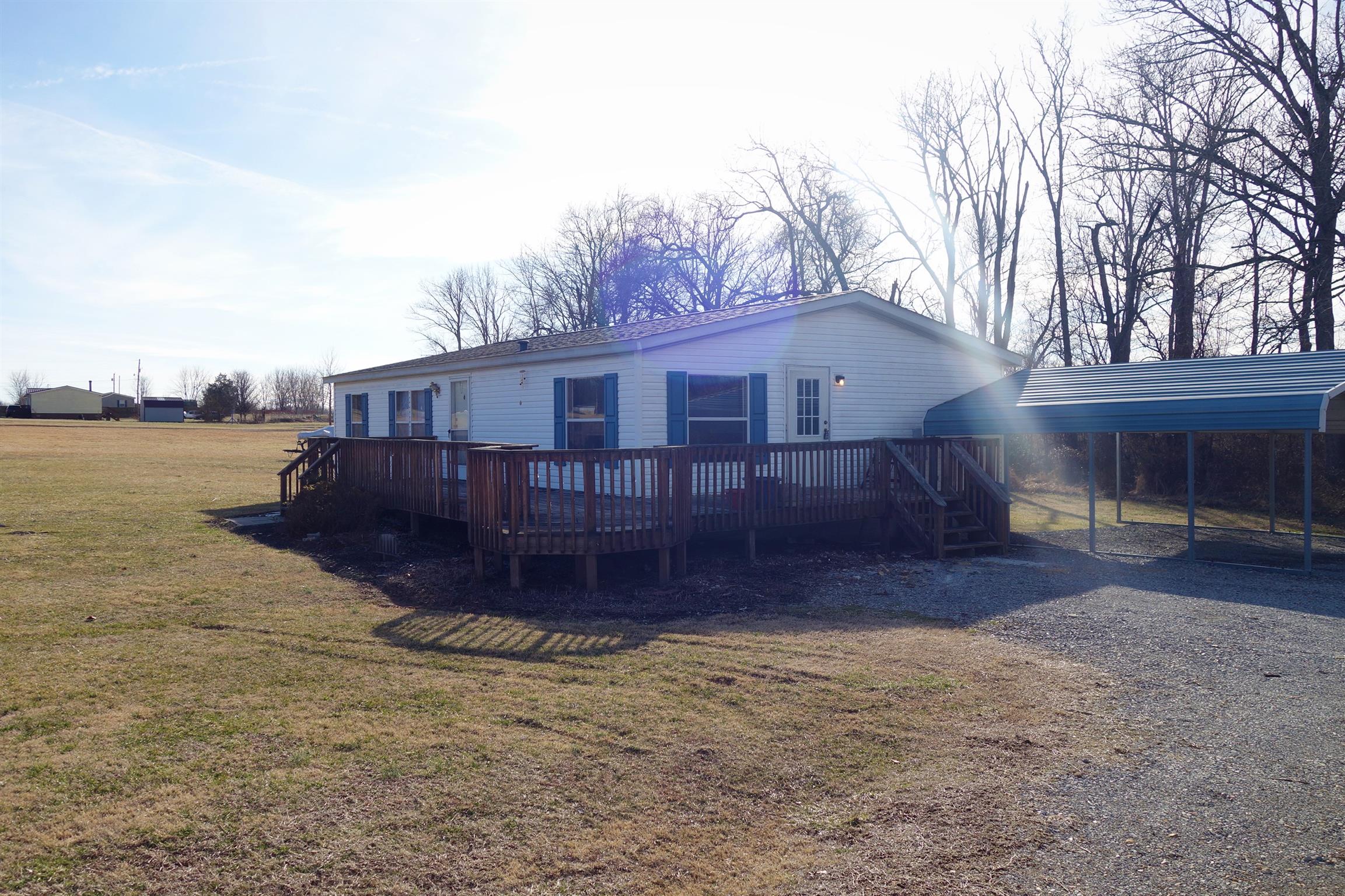114 East Biggs Road Portland, TN 37148 - Photo 13 of 26 a view of a house with a yard and sitting area