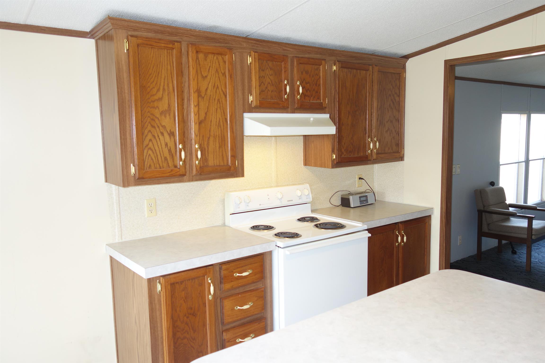 114 East Biggs Road Portland, TN 37148 - Photo 17 of 26 a kitchen with a stove and a sink