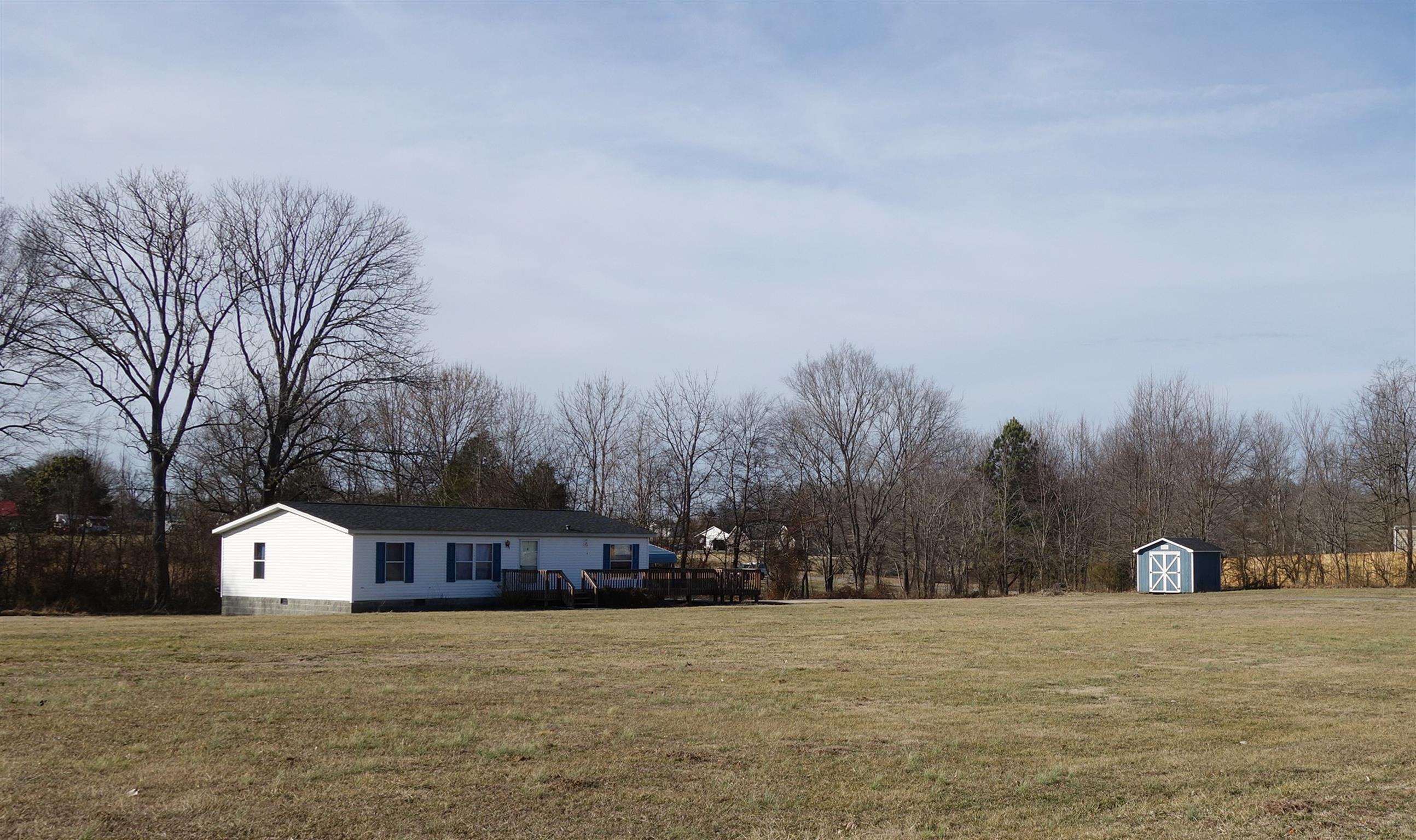 114 East Biggs Road Portland, TN 37148 - Photo 4 of 26 a view of a house with a yard