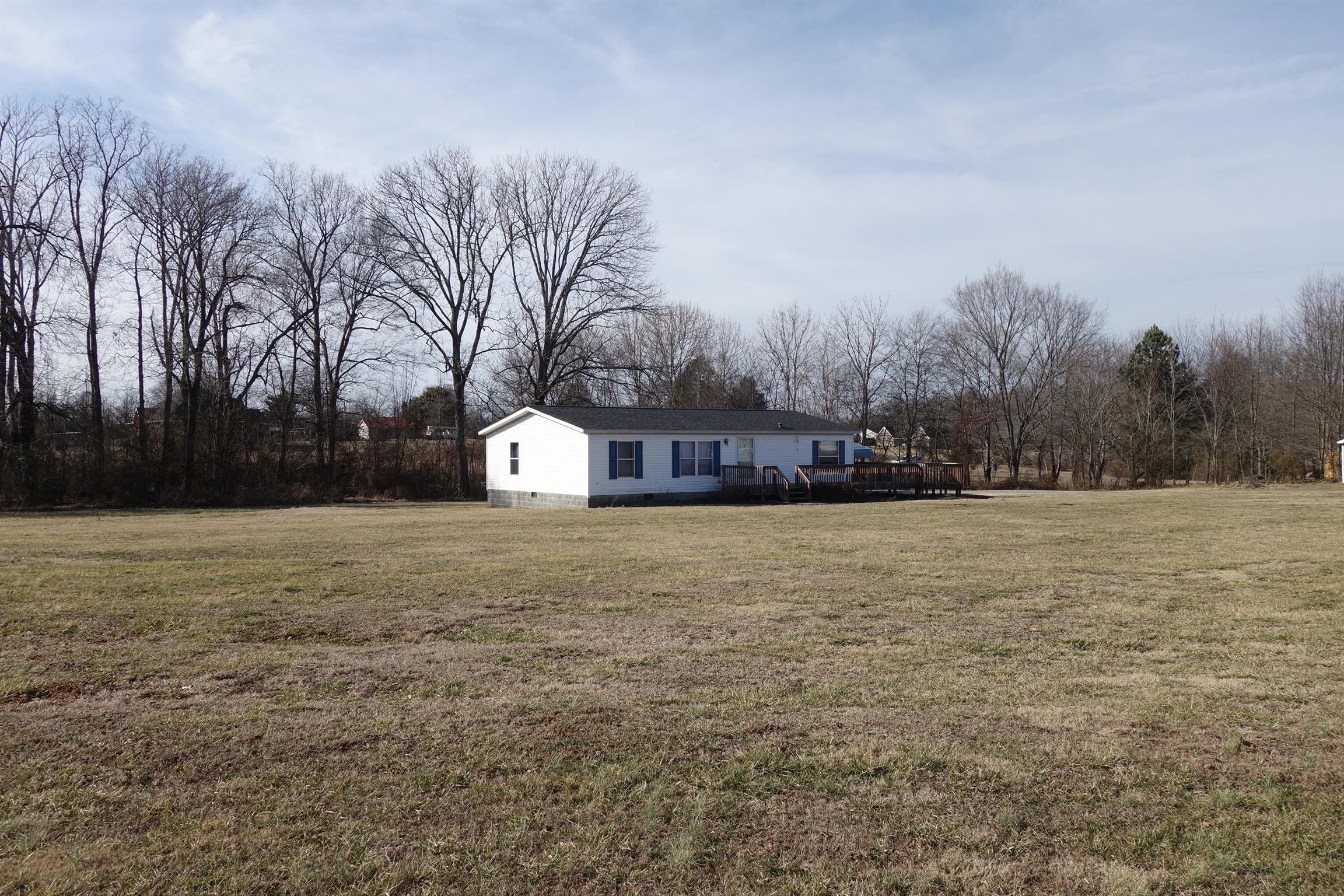 114 East Biggs Road Portland, TN 37148 - Photo 6 of 26 a house view with yard in front of it