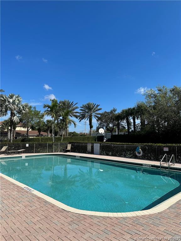 270 Southwest Walking Path Stuart, FL 34997 - Photo 20 of 25 a view of a house with a big yard