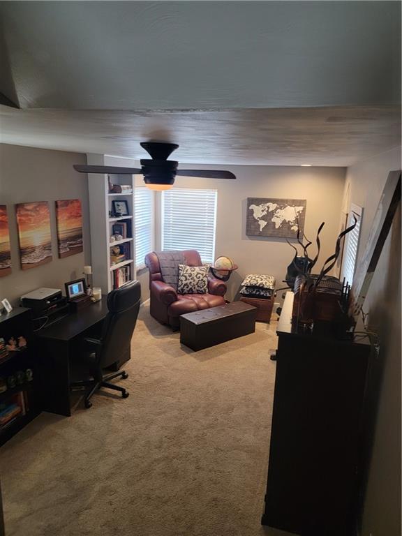 414 Hancock Avenue Vandergrift, PA 15690 - Photo 11 of 16 a living room with furniture and a flat screen tv