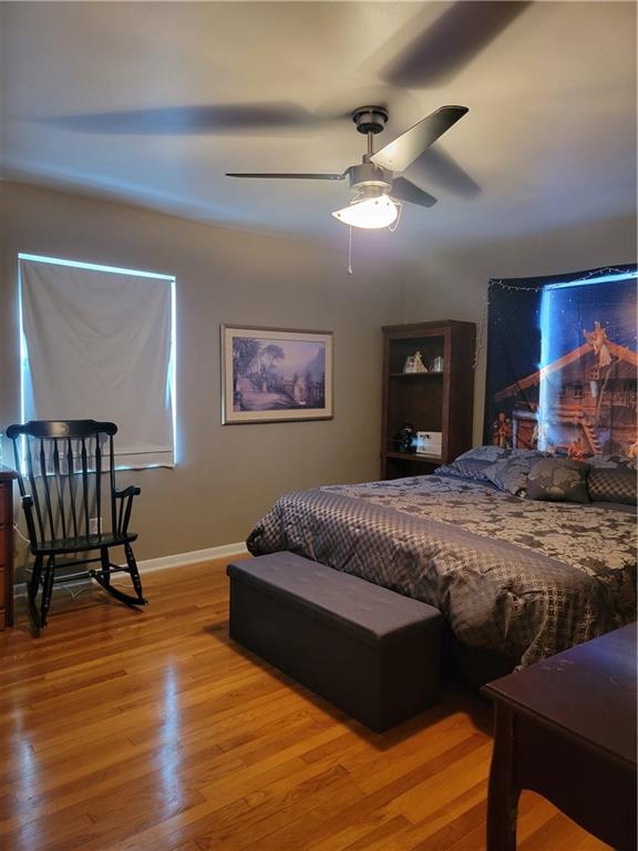 414 Hancock Avenue Vandergrift, PA 15690 - Photo 13 of 16 a bedroom with a bed and wooden floor