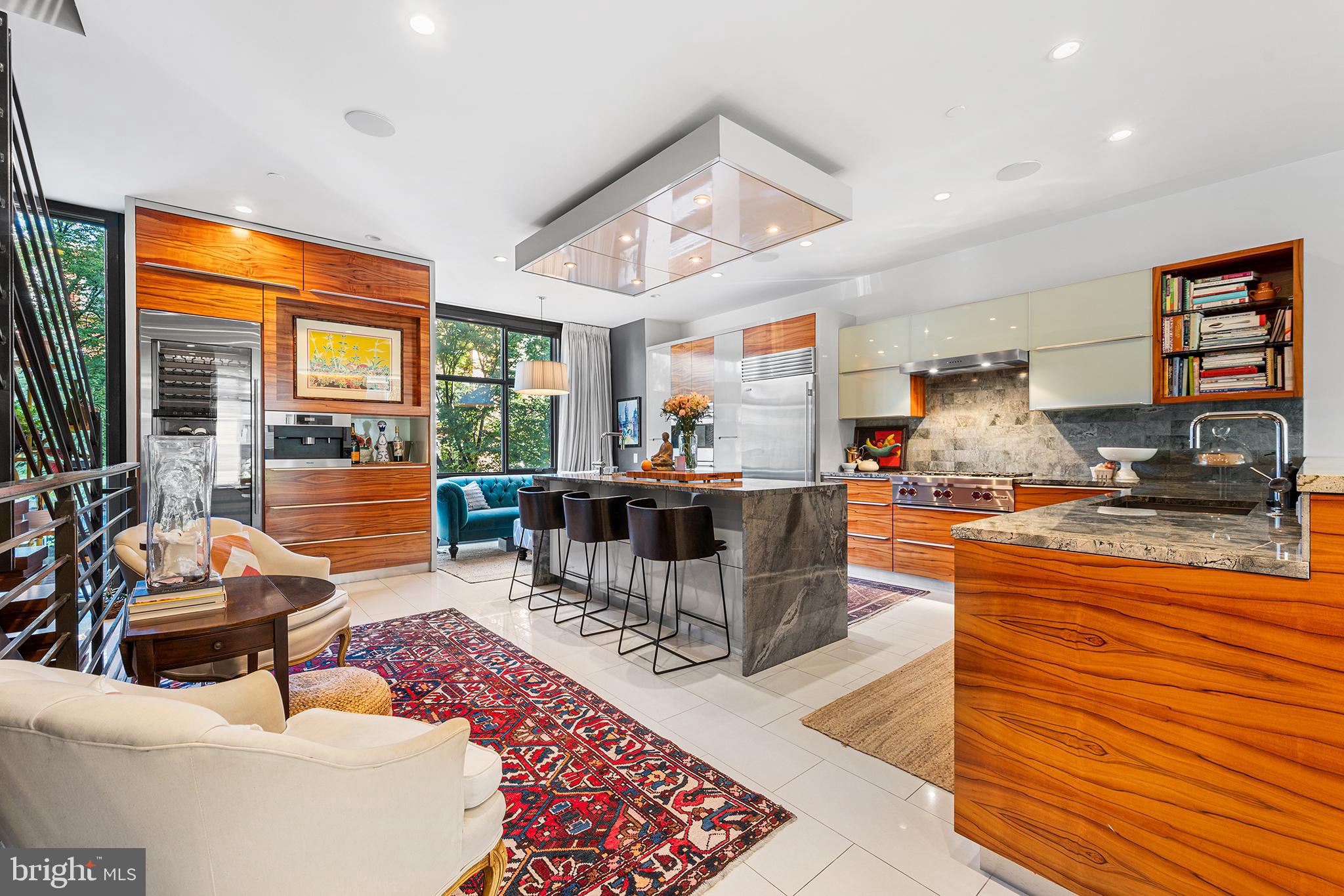 136 North 22nd Street Philadelphia, PA 19103 - Photo 13 of 78 a living room with furniture and a flat screen tv