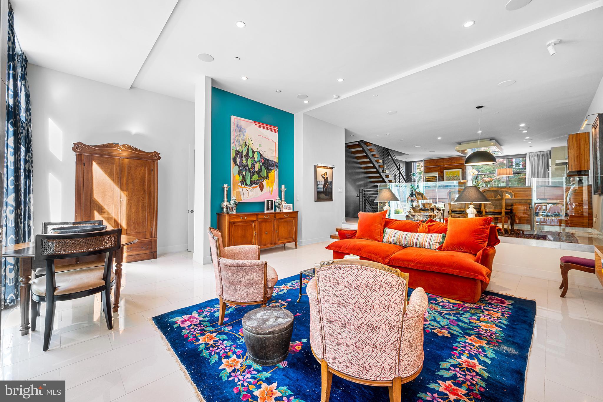136 North 22nd Street Philadelphia, PA 19103 - Photo 25 of 78 a living room with furniture a rug and a window