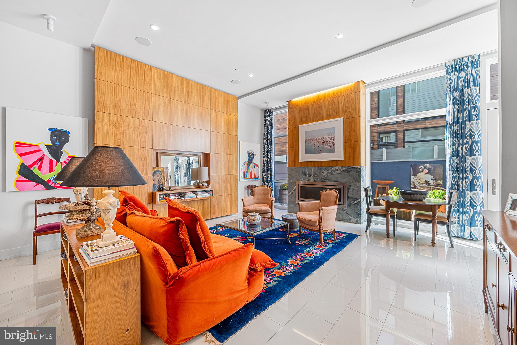 136 North 22nd Street Philadelphia, PA 19103 - Photo 26 of 78 Dramatic living room with a fireplace