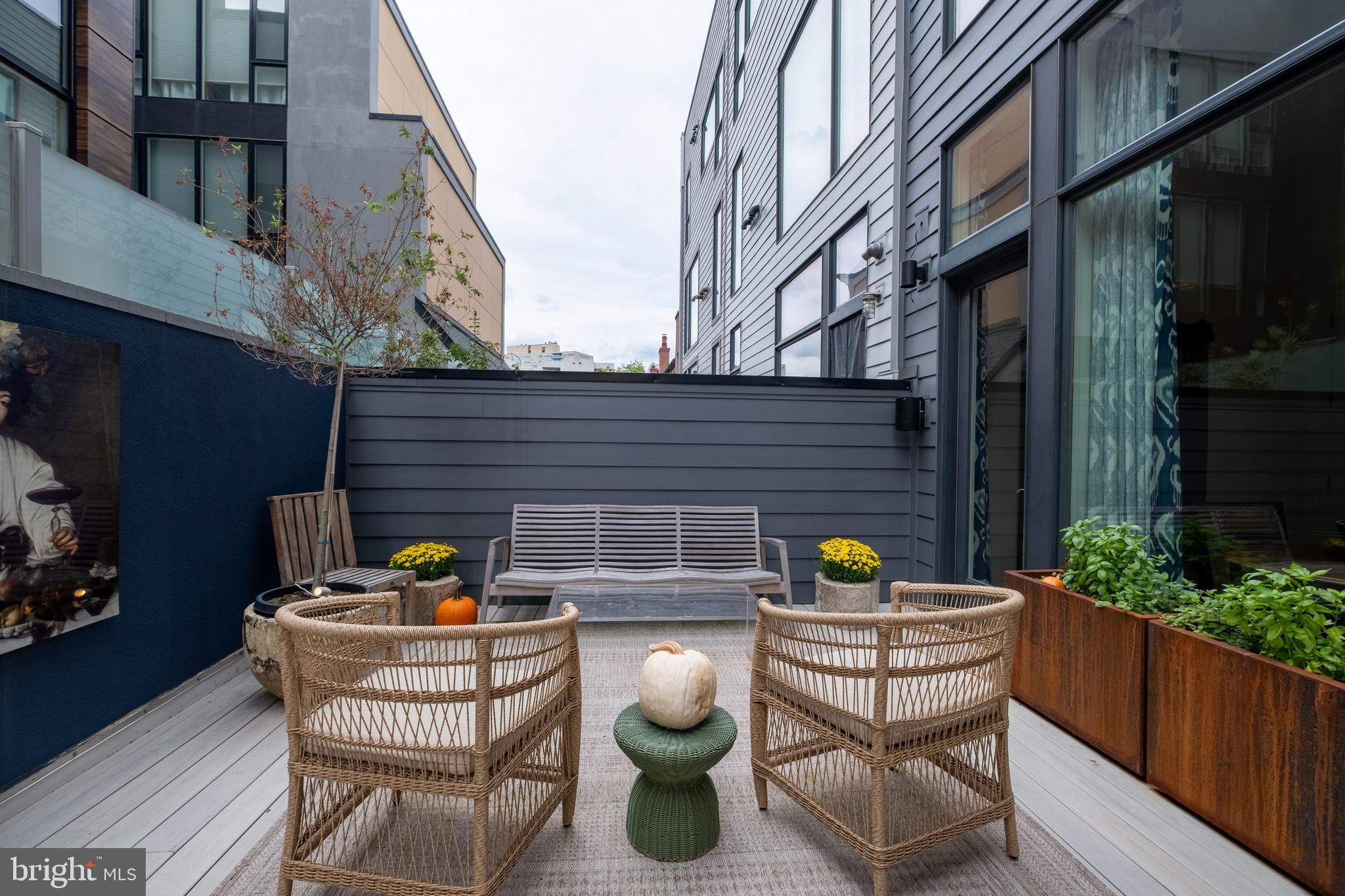 136 North 22nd Street Philadelphia, PA 19103 - Photo 32 of 78 a view of a chairs and table in a patio
