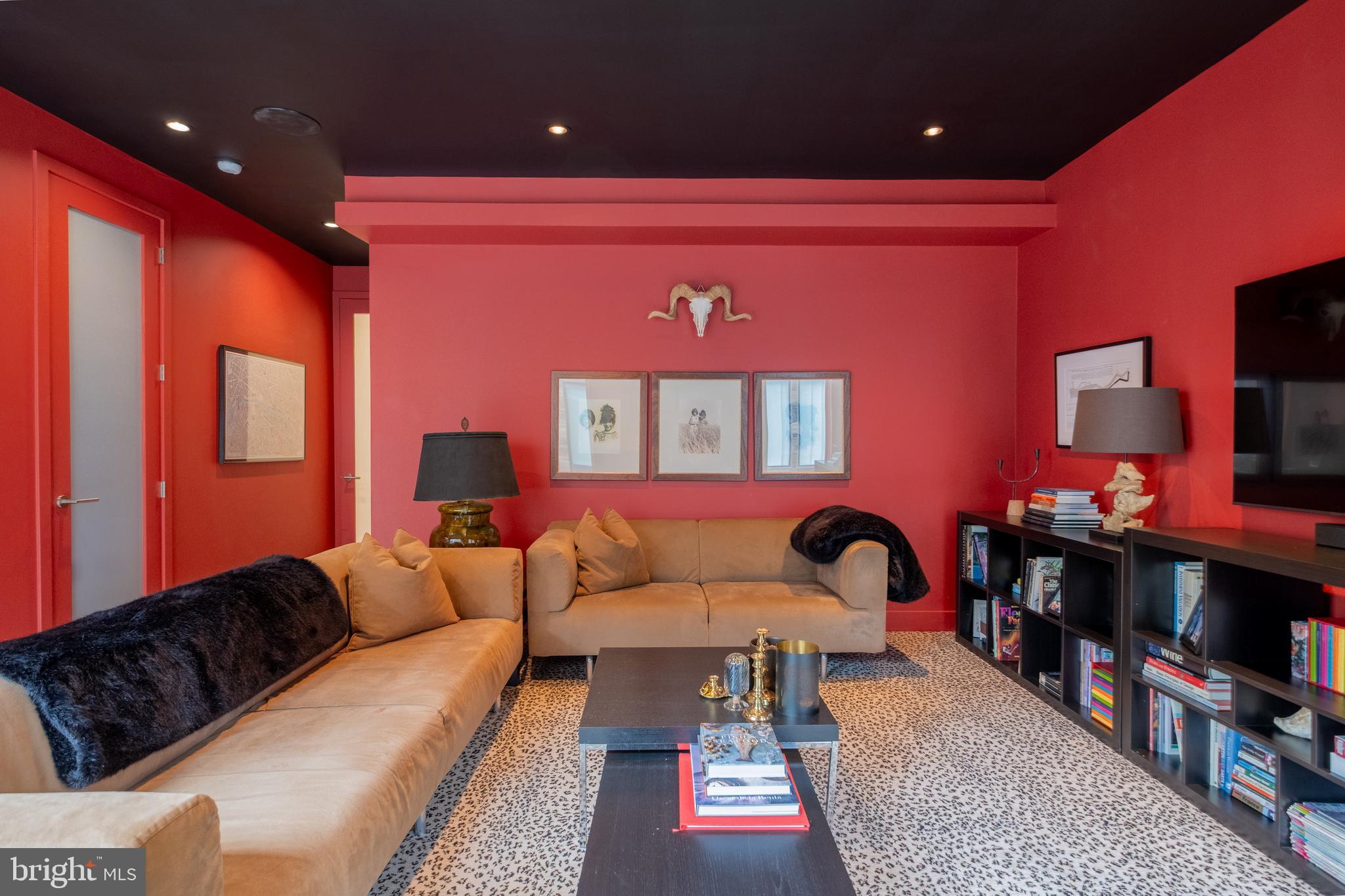 136 North 22nd Street Philadelphia, PA 19103 - Photo 36 of 78 a living room with furniture a flat screen tv and rug floor