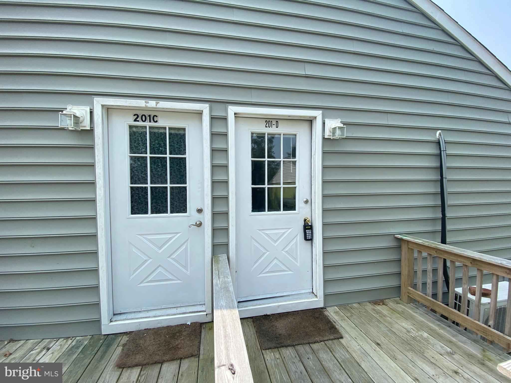 201 North Irving Avenue, Unit D Colonial Beach, VA 22443 - Photo 2 of 10 a view of front door of house