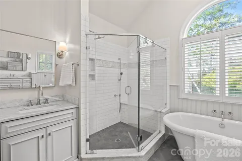 a bathroom with a bathtub and a sink