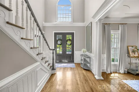 a view of an entryway with staircase