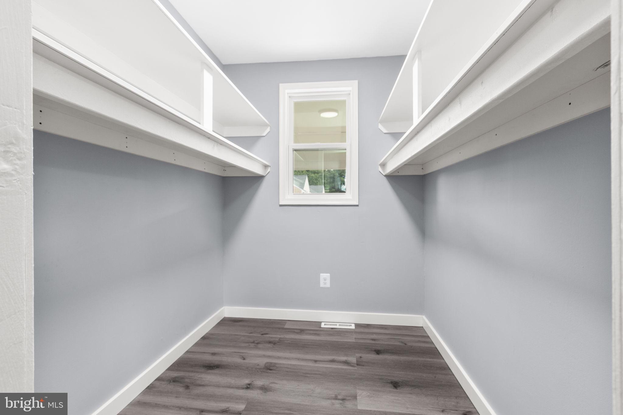 9113 Thornton Rolling Road Fredericksburg, VA 22408 - Photo 10 of 31 a view of room with window and hardwood floor
