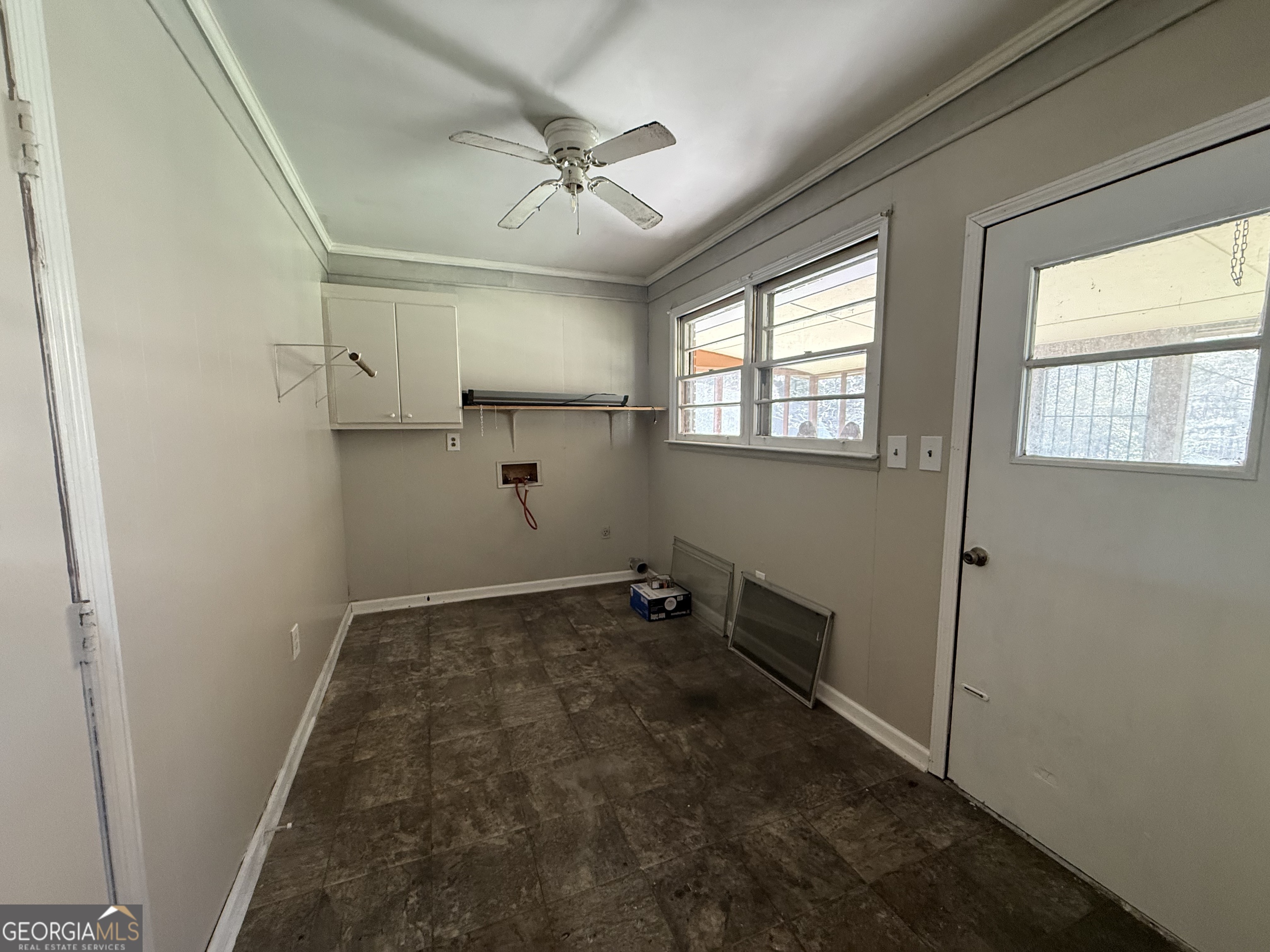 28 Brewer Road Jewell, GA 31045 - Photo 18 of 27 a view of empty room with windows