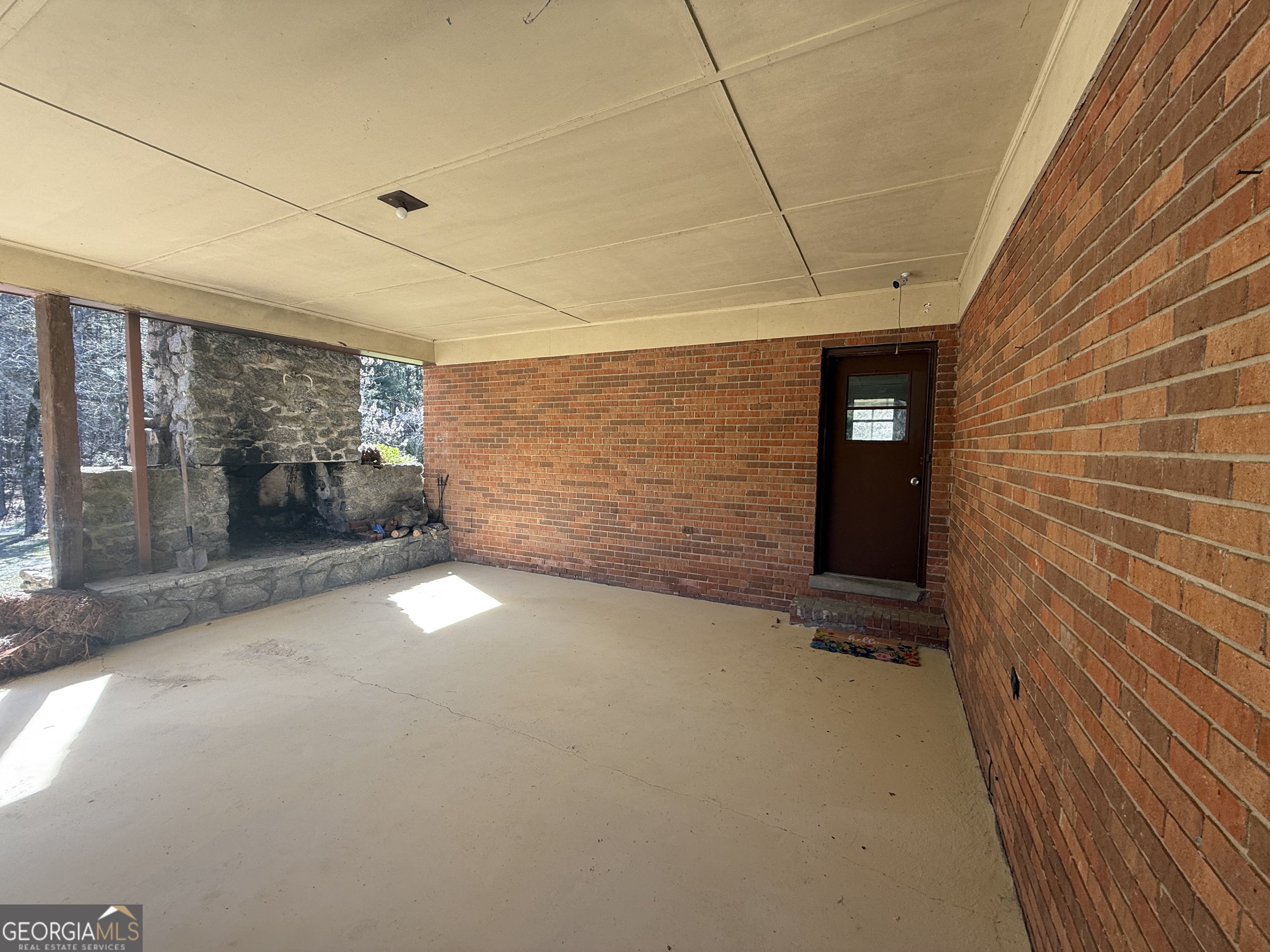28 Brewer Road Jewell, GA 31045 - Photo 21 of 27 a view of empty room with windows