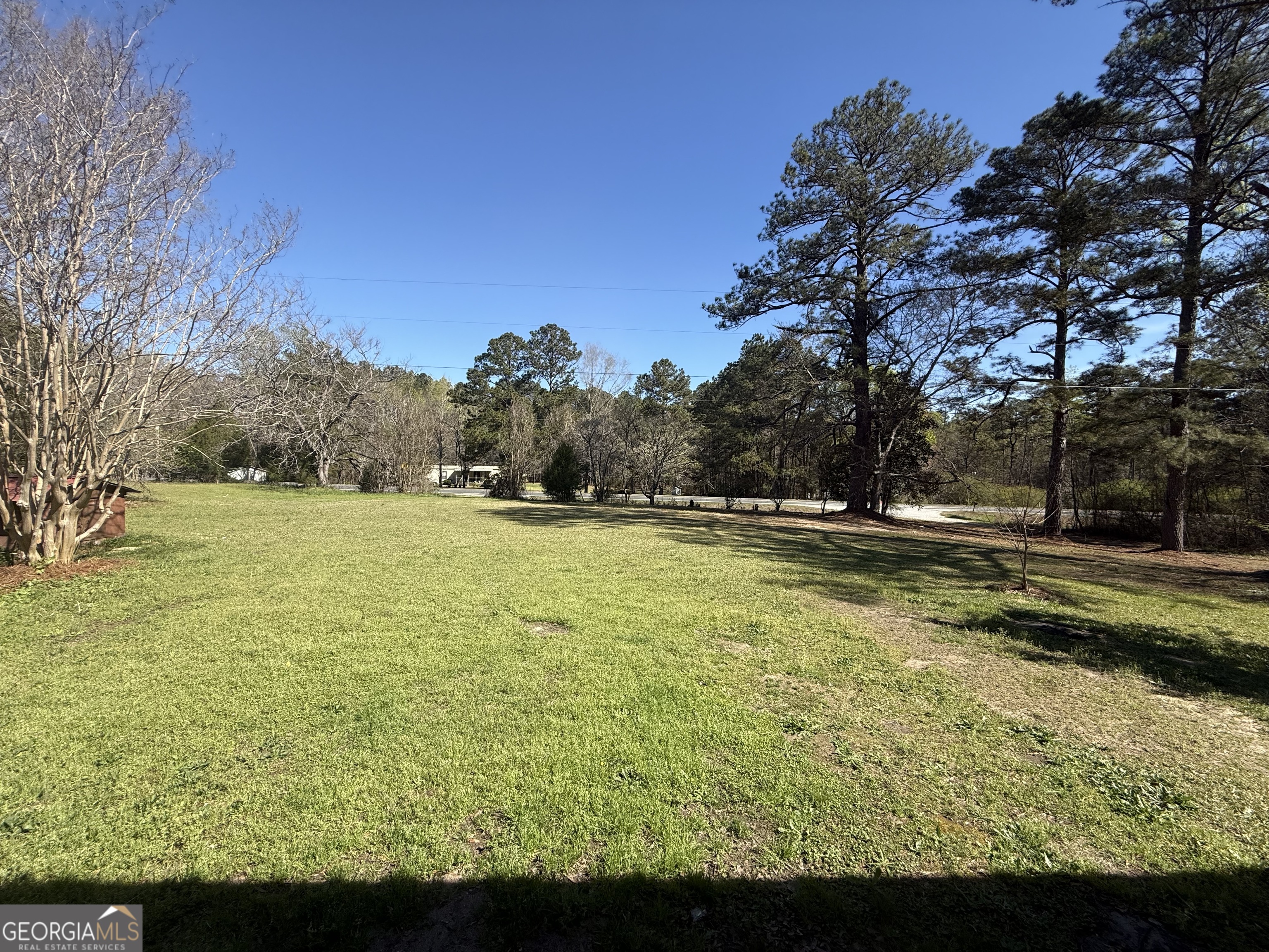 28 Brewer Road Jewell, GA 31045 - Photo 25 of 27 a view of swimming pool with an outdoor space