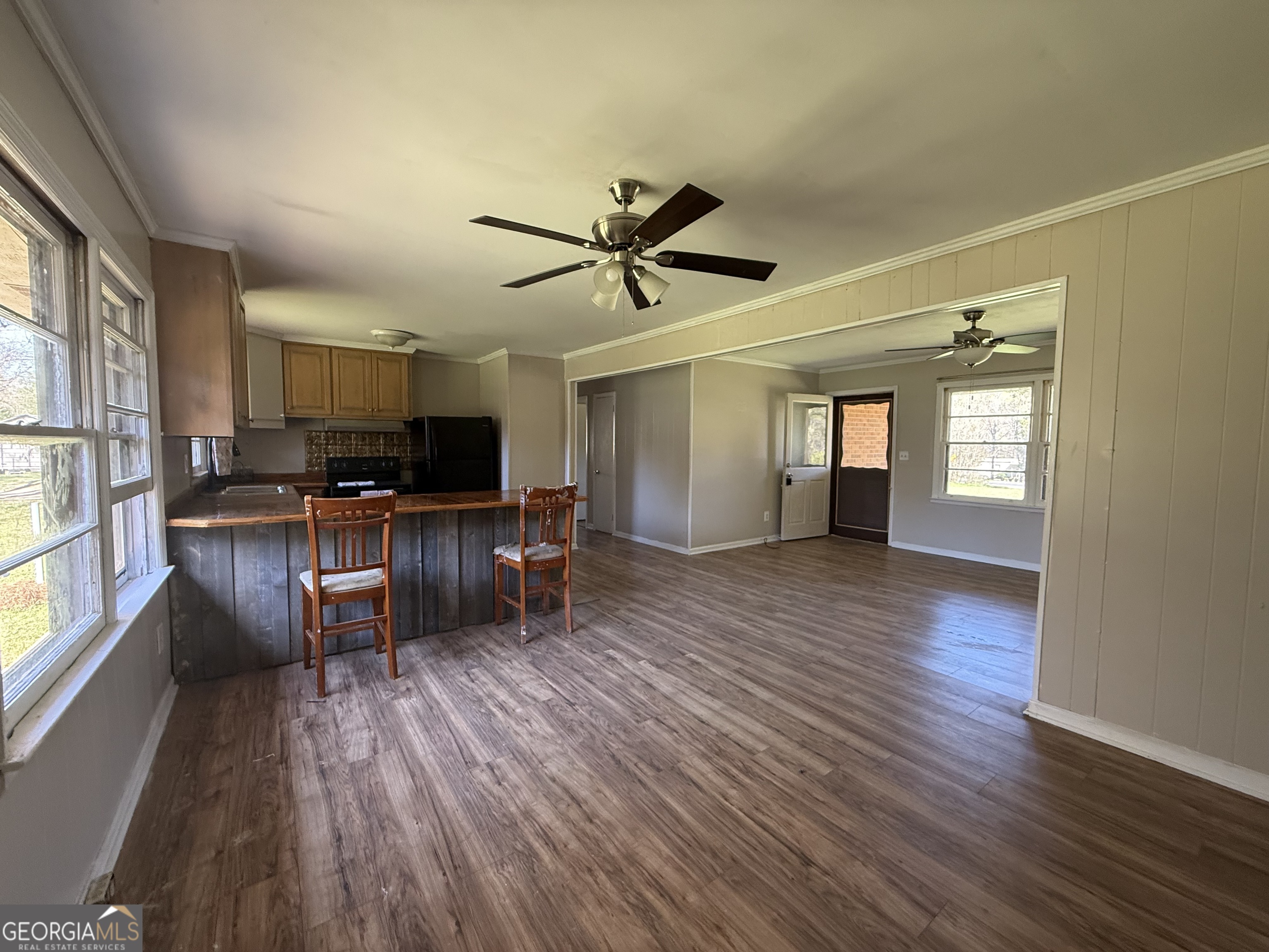 28 Brewer Road Jewell, GA 31045 - Photo 5 of 27 a living room with furniture and a wooden floor