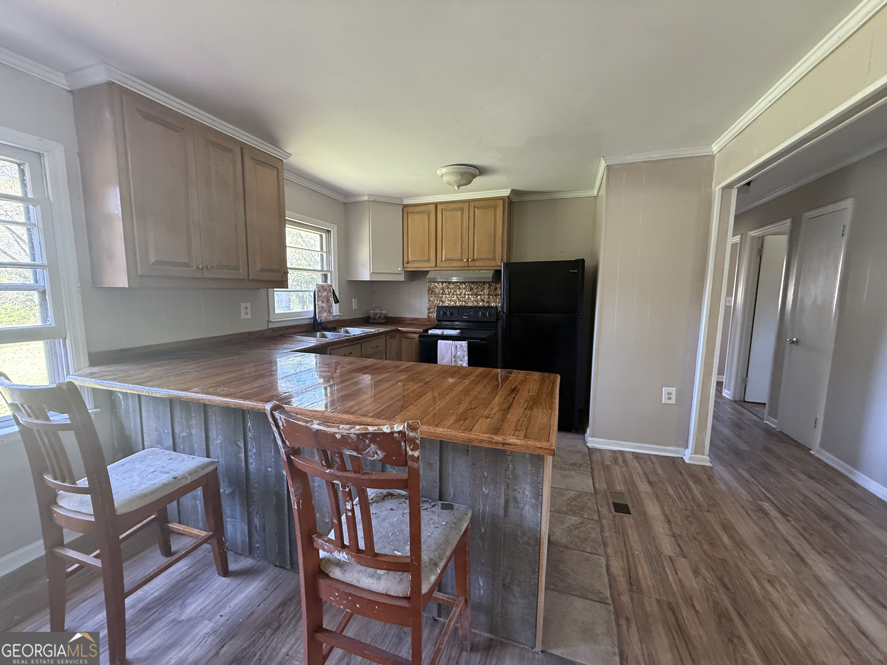 28 Brewer Road Jewell, GA 31045 - Photo 6 of 27 a dining room with furniture and wooden floor
