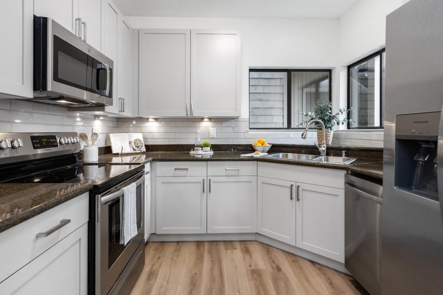 366 South Overlook Drive San Ramon, CA 94582 - Photo 11 of 31 a kitchen with stainless steel appliances granite countertop a stove a sink and a microwave