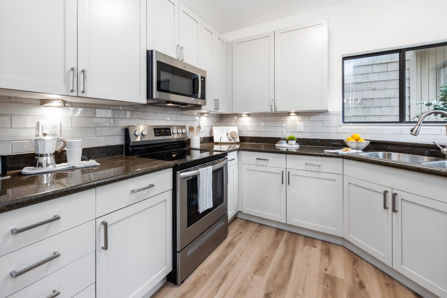 366 South Overlook Drive San Ramon, CA 94582 - Photo 12 of 31 a kitchen with granite countertop white cabinets stainless steel appliances and a sink