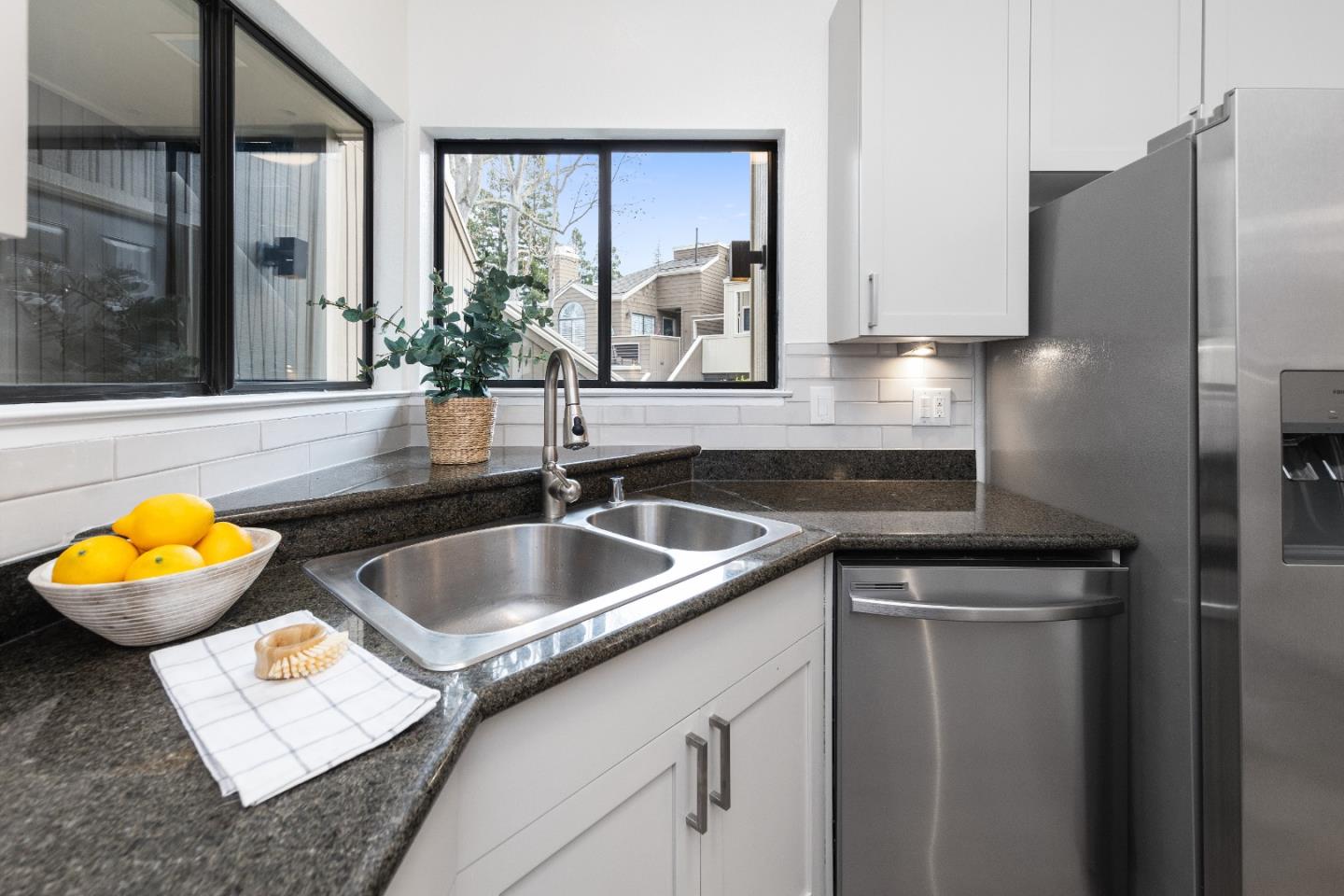 366 South Overlook Drive San Ramon, CA 94582 - Photo 13 of 31 a kitchen with granite countertop a sink and a refrigerator