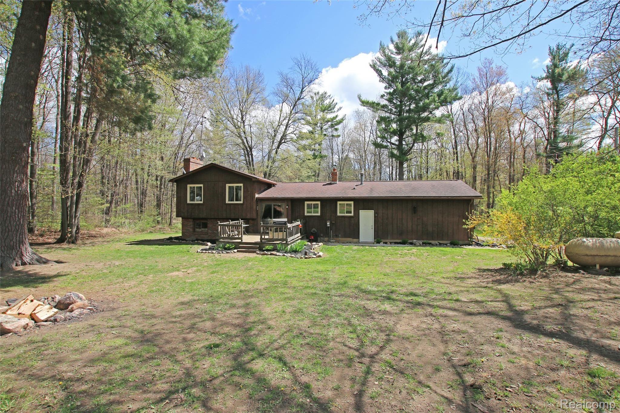 4095 Flint River Road Columbiaville, MI 48421 - Photo 42 of 84 43) Back of Home.jpg