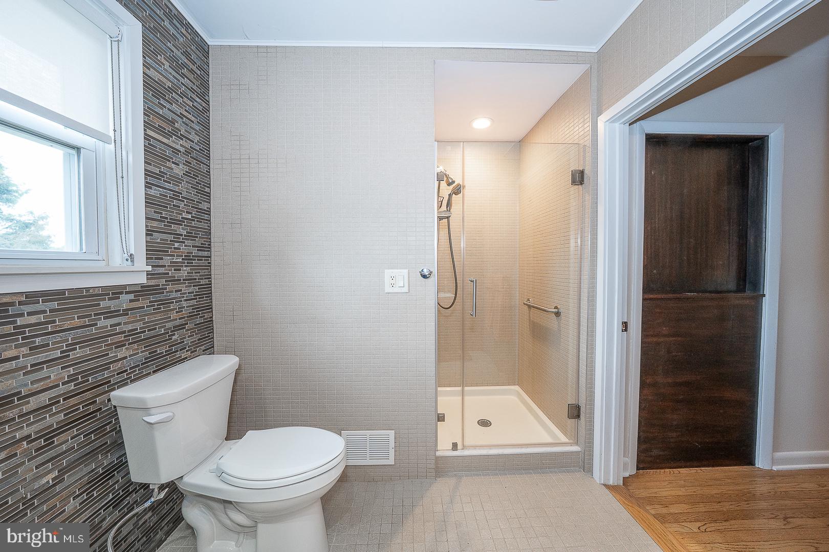 20 Fairview Road Swarthmore, PA 19081 - Photo 36 of 57 a bathroom with a toilet and a shower