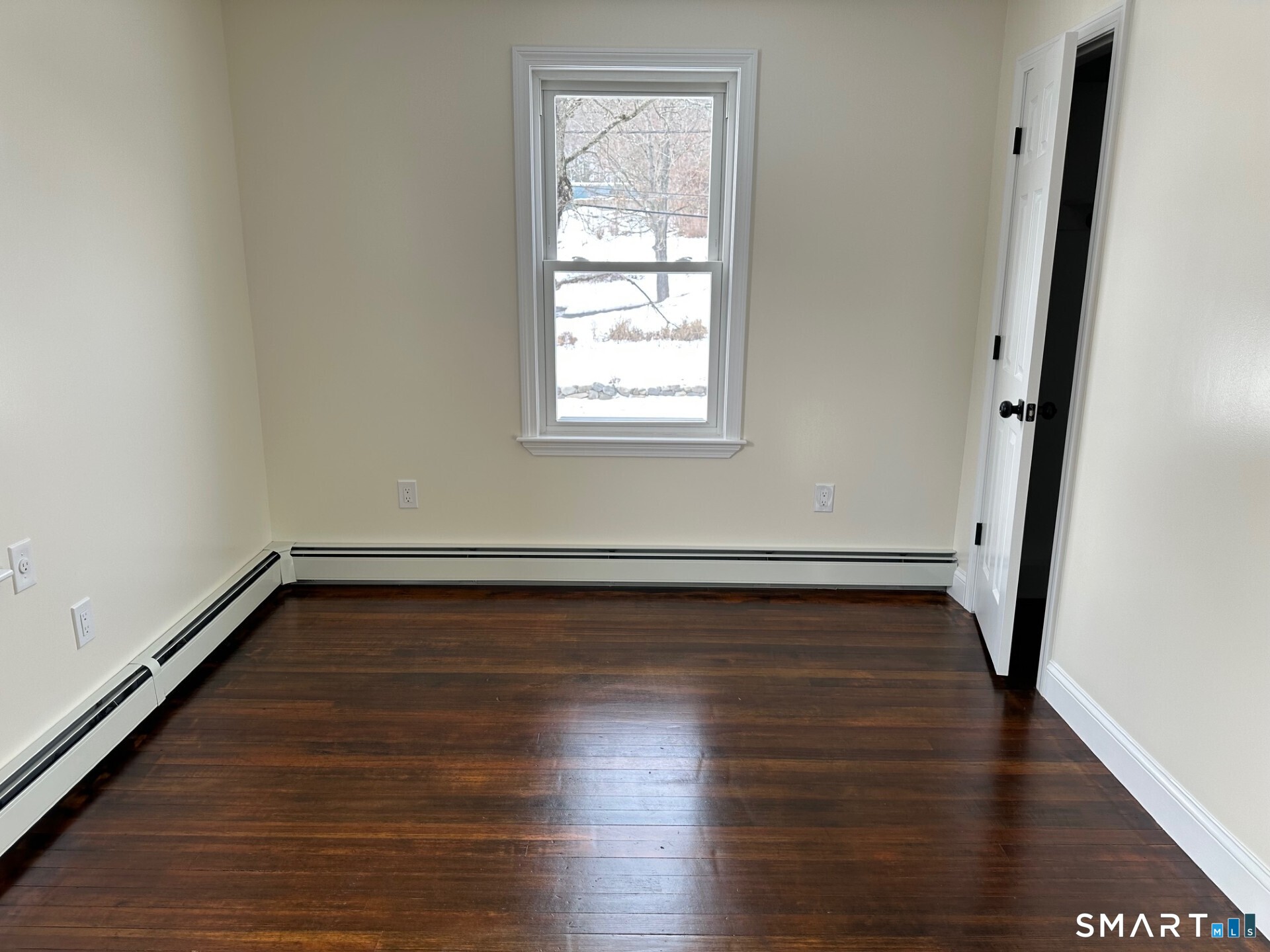 713 South Main Street Torrington, CT 06790 - Photo 8 of 10 a view of a room with wooden floors and window