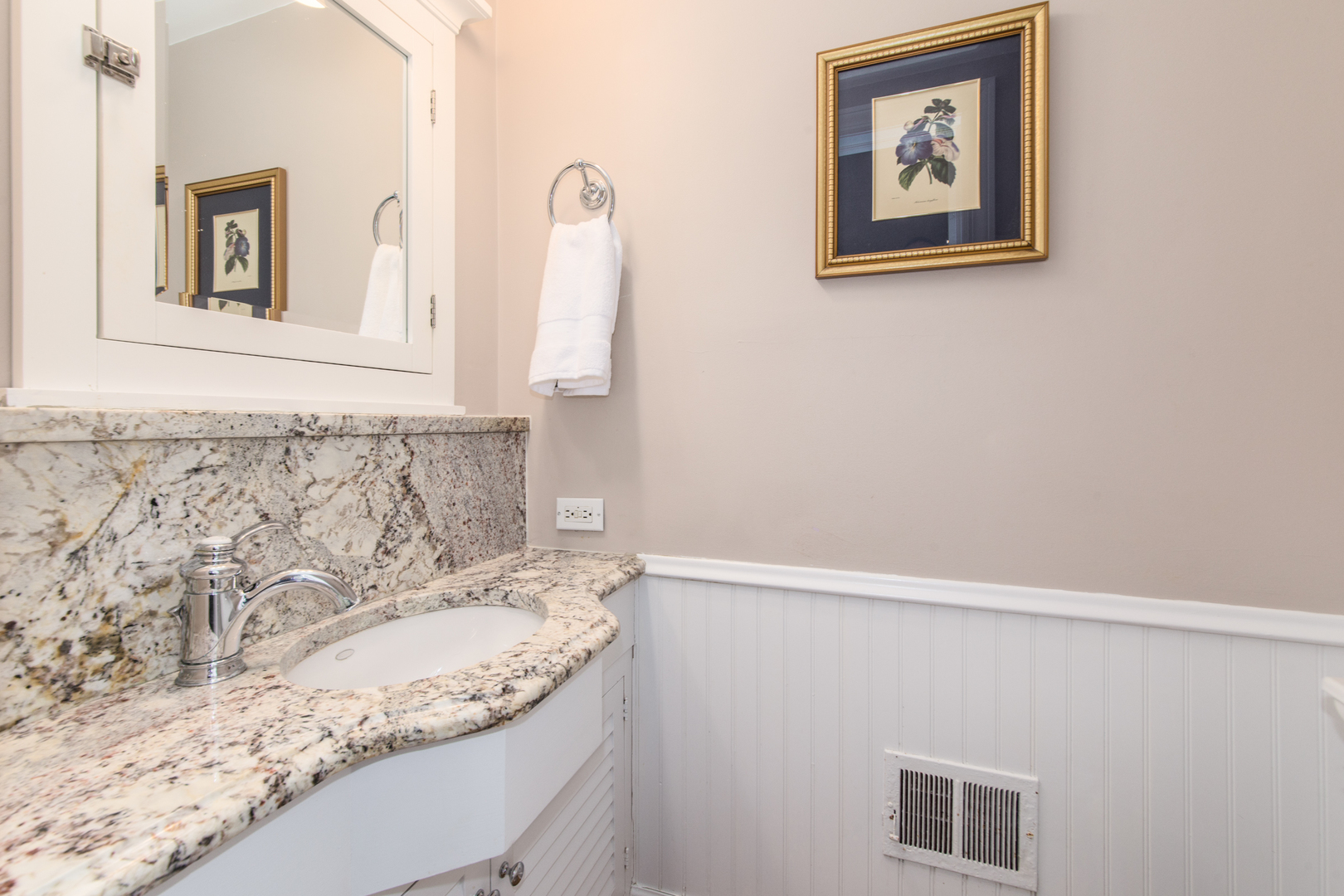 1116 South Aldine Avenue Park Ridge, IL 60068 - Photo 11 of 31 a bathroom with a granite countertop sink and a mirror