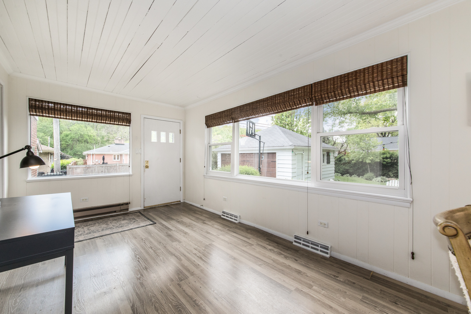 1116 South Aldine Avenue Park Ridge, IL 60068 - Photo 12 of 31 an empty room with wooden floor and windows