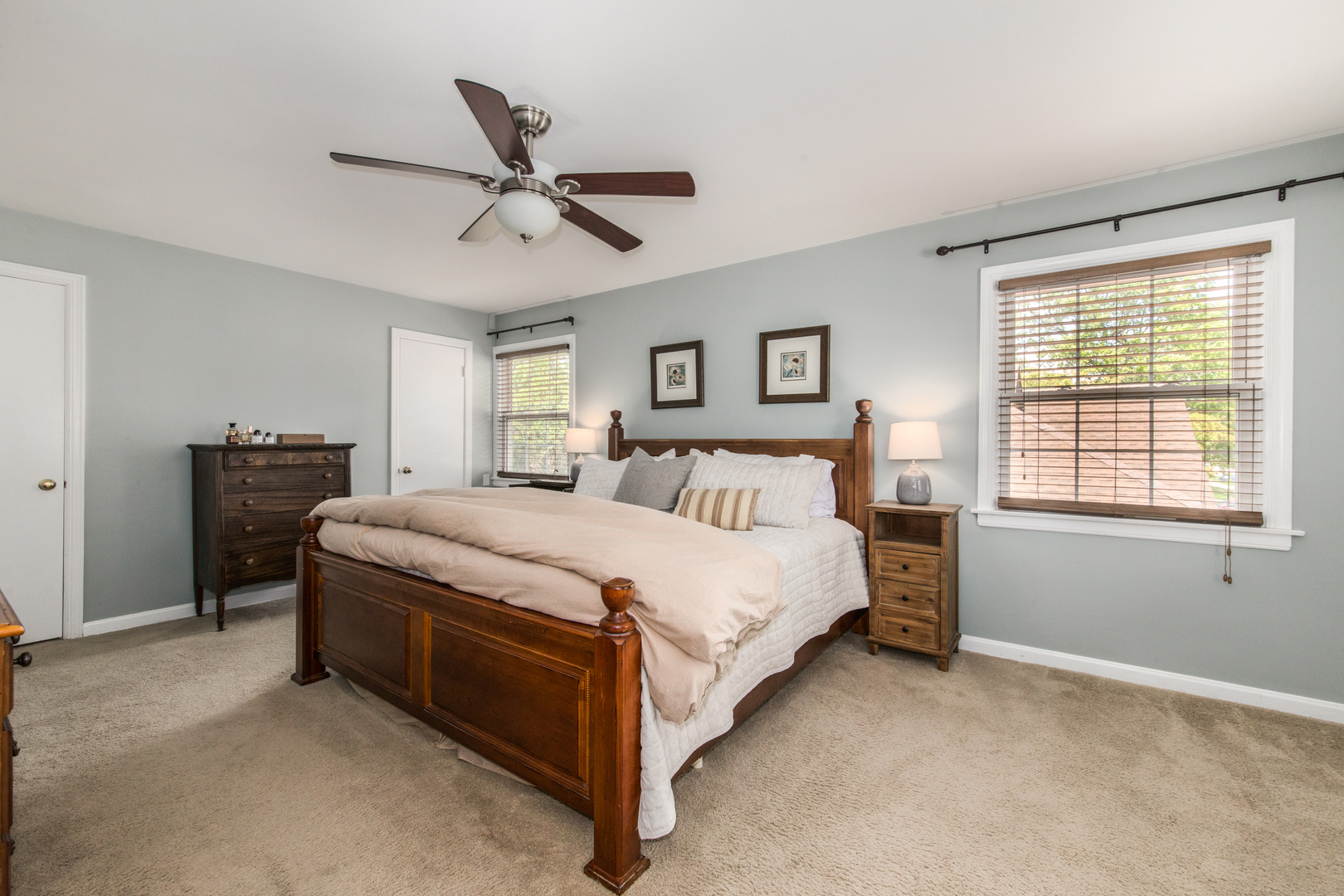 1116 South Aldine Avenue Park Ridge, IL 60068 - Photo 15 of 31 a bed room with a bed and a ceiling fan